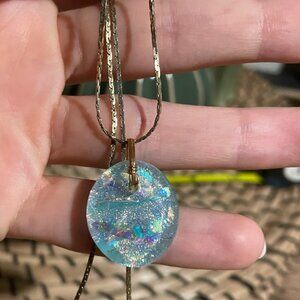 Gold necklace with stone design